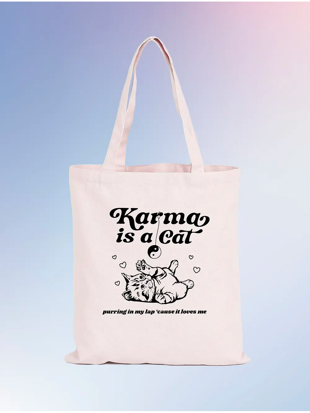 Totebag Karma is a cat