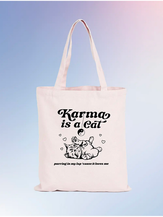 Totebag Karma is a cat